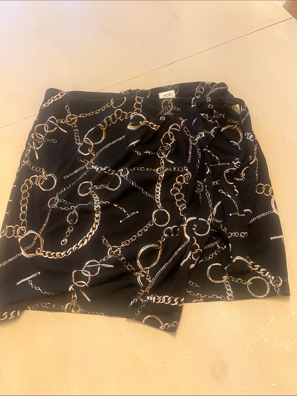 Cache Black Mini Skirt with Gold Chain Print